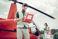 Volunteer opening first aid box and checking everything inside