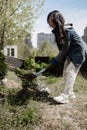 volunteer planting a tree, hands with a shovel digs the ground, nature, environment and environment Royalty Free Stock Photo