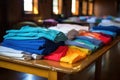 volunteer t-shirts neatly folded on a table