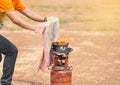 Volunteer using wet cloth or damp cloth beat the flame out during basic fire fighting training Royalty Free Stock Photo