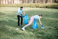 Volunteers cleaning public park from the rubbish