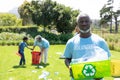 Volunteers collecting rubbish and recycling Royalty Free Stock Photo