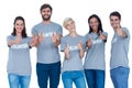 Volunteers gesturing thumbs up Royalty Free Stock Photo