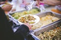 Volunteers give food to the poor: concept of charity food for the poor Royalty Free Stock Photo