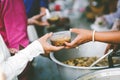 Volunteers give food to the poor: concept of charity food for the poor Royalty Free Stock Photo