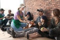Volunteers giving food to poor people