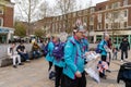 Volunteers hand out hats and flags at King Charles III coronation event in Kingston upon Hull, UK