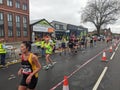 Volunteers hand out water, Manchester Marathon 2023