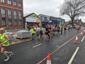 Volunteers hand out water, Manchester Marathon 2023