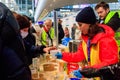 Volunteers help refugees from Ukraine at the railway station in Warsaw, Poland