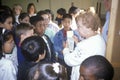 Volunteers instructing young people Royalty Free Stock Photo