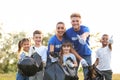 Volunteers and kids with bags of trash Royalty Free Stock Photo