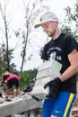 Volunteers from the 'Repair Together' organisation cleaning up the local House of Culture