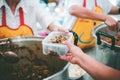 Volunteers serving food for poor people : concept of free food serving Royalty Free Stock Photo