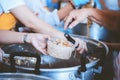 Volunteers serving food for poor people : concept of free food serving Royalty Free Stock Photo