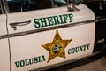 Volusia county Sheriff police car from the side