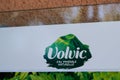 Volvic sign and text logo on the windows wall of restaurant bar