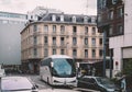 Volvo Atomic bus coach on the tiny street near hotel entrance Royalty Free Stock Photo