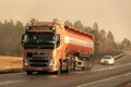 Volvo FH Semi Bulk Transport Truck in Winter Afternoon Snowstorm