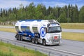 Volvo FH Truck Pulls Three Compartment Tank Trailer on Road Royalty Free Stock Photo