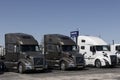 Volvo Semi Tractor Trailer Big Rig Truck display at a dealership. Volvo Trucks supplies complete transport solutions