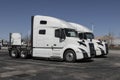 Volvo Semi Tractor Trailer Big Rig Truck display at a dealership. Volvo Trucks supplies complete transport solutions