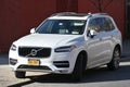 Volvo XC90 car parked on a road