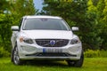 Volvo XC60 white color in green nature Royalty Free Stock Photo