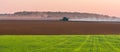 Volya, Ternopil region, Ukraine October 10, 2021. A combine harvests soybeans, a tractor plows the field. Panorama of agricultural Royalty Free Stock Photo