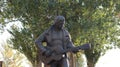 Volzhsky  Russia - Bronze sculpture of the great poet and actor of the USSR Vladimir Vysotsky in the autumn Park with a guitar Royalty Free Stock Photo