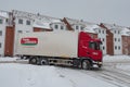 Lorry driving on a snowy day