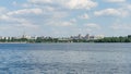 Voronezh. Blue waves of river and line of new houses on other side. White clouds in blue sky. Beautiful nature landscape Royalty Free Stock Photo