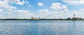 Voronezh. Blue waves of river and line of new houses on other side. White clouds in blue sky. Beautiful nature landscape Royalty Free Stock Photo