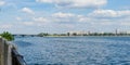 Voronezh. Blue waves of river and line of new houses on other side. White clouds in blue sky. Beautiful nature landscape Royalty Free Stock Photo