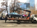 Voronezh, Russia - Circa November 2017: Evacuator takes an incorrectly parked car in downtown