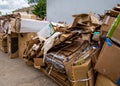 Cardboard boxes are stacked at the waste paper reception point