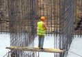 Reinforcer at a construction site carries out the binding of the frame