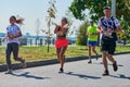 Marathon runners on city road Royalty Free Stock Photo