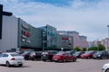 The building of the Arena trading house in Voronezh, cars in the parking lot