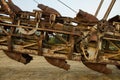 Fragment of a multi-bucket excavator giant against the light against the sunset