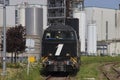 Vossloh locomotive from Rail Force One leaving shunting yard in the Port of Rotterdam Royalty Free Stock Photo