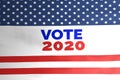 Vote 2020 on american flag illustration, USA Presidential election 2020 concept during covid-19 Royalty Free Stock Photo