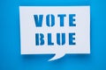 Vote blue text design with letter cutouts . Elections in the United States