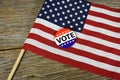 Vote button on American flag Royalty Free Stock Photo