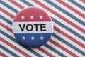 Vote button on red, white and blue Royalty Free Stock Photo