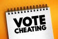 Vote Cheating text on notepad concept for presentations and reports