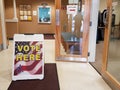 Vote here sign in a small town voting location