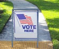 VOTE HERE SIGN in the USA Royalty Free Stock Photo