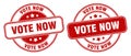Vote now stamp. vote now label. round grunge sign Royalty Free Stock Photo