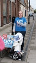 Vote Remain campaigner seen giving out information in an English town. Royalty Free Stock Photo